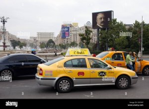 bucharest-romania-taxis-and-traffic-on-the-course-of-the-unit-skoda-D203KF.jpg