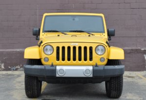 2015-Jeep-Wrangler-Unlimited-Sahara-front-yellow.jpg