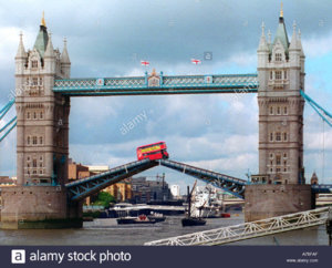 tower-bridge-and-london-bus-jumping-the-gap-as-the-bridge-opens-A75FAF.jpg