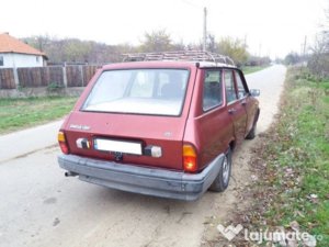 30650981-280a-47a8-bffe-59047b75f0ed_dacia-1310-break-82-000km-rosu-metalizat.jpg