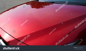 stock-photo-close-up-of-red-metallic-paint-coating-car-body-1471907120.jpg