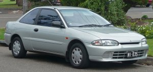 1280px-1995-1996_Mitsubishi_Lancer_CC_GLXi_coupe_01.jpg