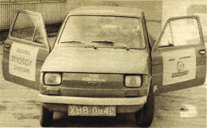 1644053920f19cfb-fiat-126p-650-przod-z-otwartymi-drzwiami.png